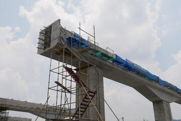 SEREMBAN, MALAYSIA -MAY 24, 2020: Temporary access and metal staircase made from staging,...