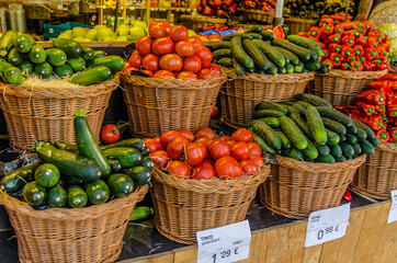 Fresh organic fruits and vegetables on display in a food stall in Barcelona, Spain