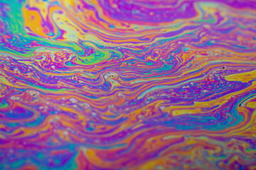 Abstract background texture of iridescent paints. Soap bubble
