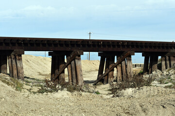 River bridge going through dirt canal