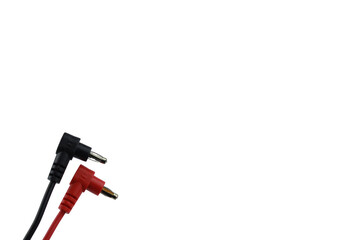 Black and red wire connector from the multimeter on a white background.