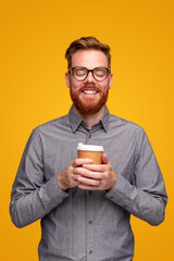 Happy man enjoying coffee in morning