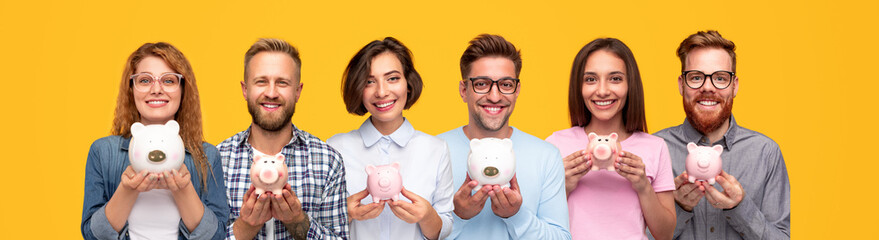 Positive young people with piggy banks