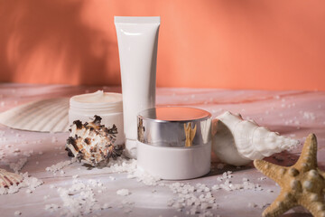 Sea Salt Skin Care Cosmetics. Dead sea natural cream on a marble background.