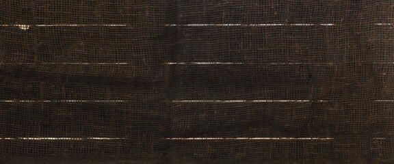 Background image of boards with slits and burlap