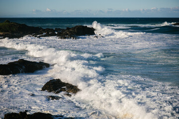 waves breaking on the beach