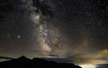Night shot of the Milky Way at Jaufenpass in South Tyrol, Italy