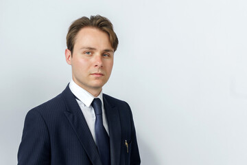 Businessman in a blue suit on a white background.