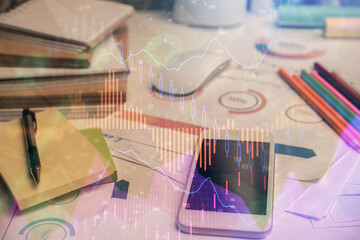 Double exposure of forex chart drawing and cell phone background. Concept of financial data analysis
