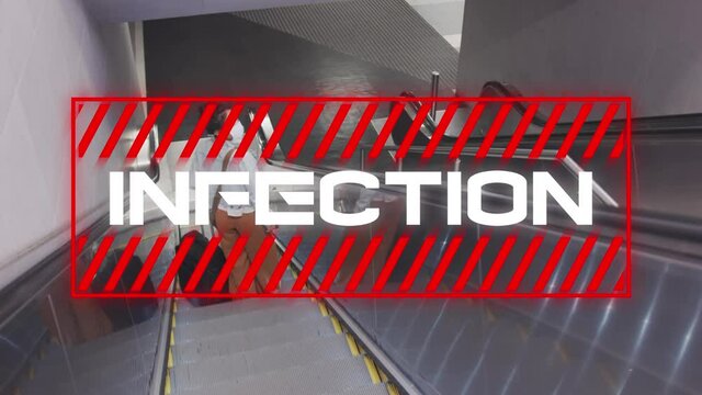 Infection text against woman using escalator