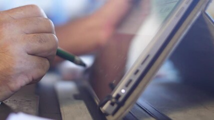 using pen for touching the digital tablet screen slow motion - Powered by Adobe