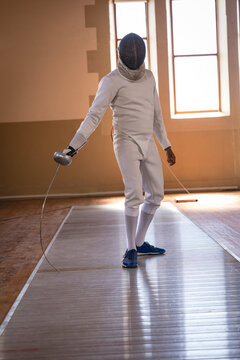 Man practicing fencing