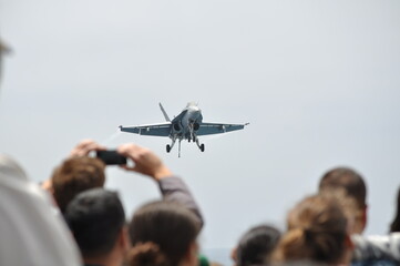 Fighter jet approaching to initiate landing