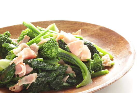 Chinese Food, Bacon And Broccoli Stir Fried On Wooden Plate