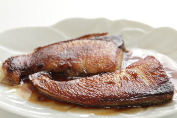 Japanese food, pan fried yellow tail Buri fish served soy sauce