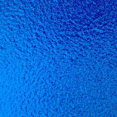 Blue metallic foil paper texture background.