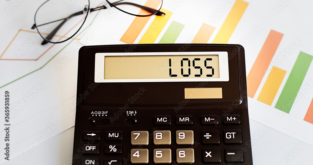 Poster calculator with the word loss on the display with chart and glasses