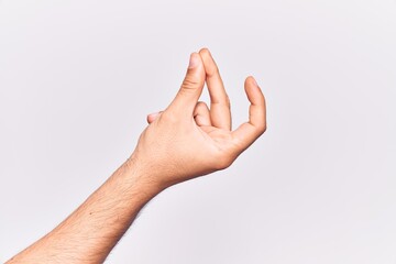 Close up of hand of young caucasian man over isolated background snapping fingers for success, easy...