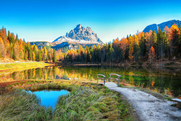 Astonishing view of popular travel destination mountain lake Antorno in autumn