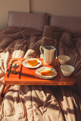 breakfast in bed with window light