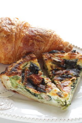 homemade quiche and croissant for gourmet bunch
