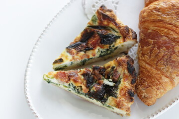 homemade quiche and croissant for gourmet bunch