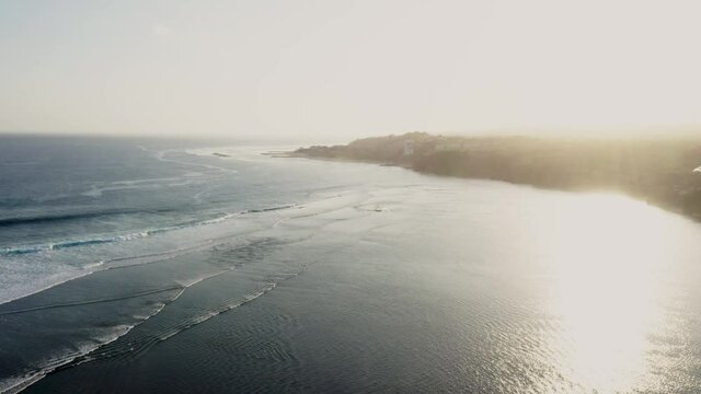 Sunset at Geger Beach, Indonesia. Bali coastline