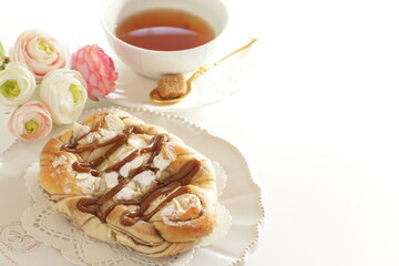 Homemade caramel and chocolate bun with copy space