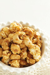 nut and caramel popcorn in bowl for snack food