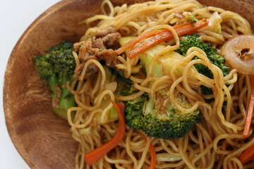 Chinese food, shrimp and broccoli in fried noodles