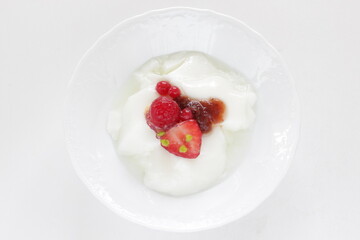 Strawberry Jam and nut on Yogurt for healthy breakfast