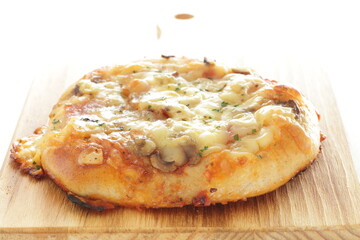 homemade cheese and mushroom bacon pizza