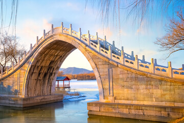 Xiuyi bridge, stands at the largest estuary of Kunming Lake and links the lake with Chang River,...