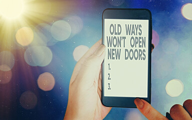 Conceptual hand writing showing Old Ways Wont Open New Doors. Concept meaning Making life changes...