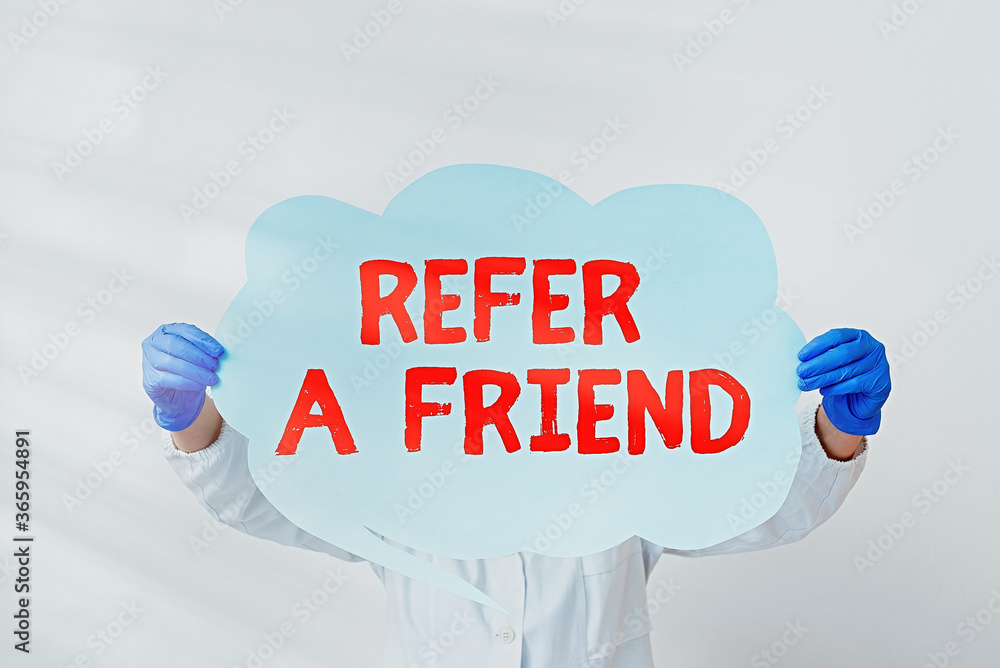Aufkleber writing note showing refer a friend. business concept for direct someone to another or send him some
