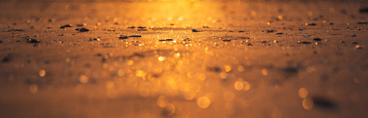 Beach sand bokeh banner size background