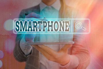 Writing note showing Smartphone. Business concept for a mobile phone that performs many of the...