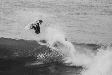 surfing in the sea bnw