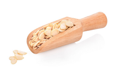 watermelon seeds in wooden spoon isolated on white background.
