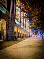 City sidewalk at night in Arlington Texas
