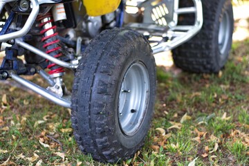 Closeup of quad wheel in nature