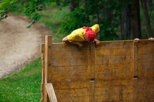 City Riga, Latvia. Run race, people were engaged in sports activities. Overcoming various obstacles and running.