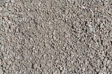 Small gray crushed stone crushed. Abstract background.