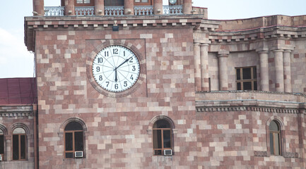 Fototapeta na wymiar Clock of Government house in Republic square. Yerevan. Armenia