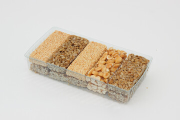 Gozinaki - traditional confection made of caramelized nuts and seeds with honey