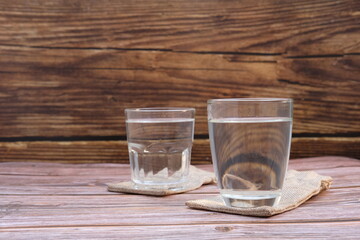 glass of beer on wooden table