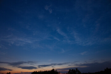 Obraz premium Comet NEOWISE in the sky after sunset. Photo taken in Fitchburg, Massachusetts MA, USA on July 19th, 2020. 