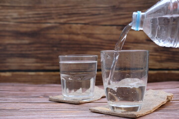 Glasses of water on the table background and space for text 
