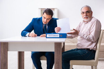 Young male lawyer visiting old man in testament concept