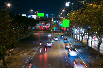 Fototapeta na wymiar Traffic at Arun Amarin junction at night with the .Boromarajonani Skyway Is an expressway heading to the south and west of Thailand.